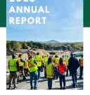 2023 Annual Report Cover with people looking at a transfer station yard