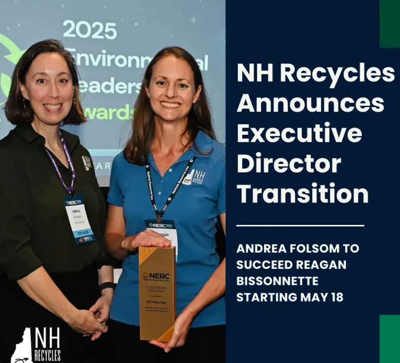 Two women standing next to each other smiling while holding an award
