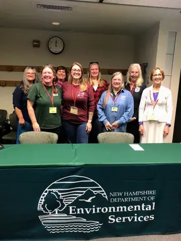 Women in from of NHDES table
