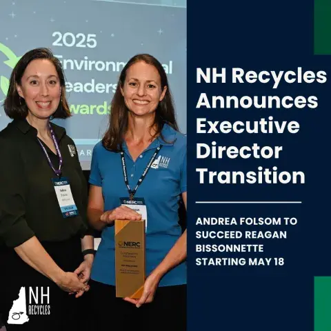 Two women standing next to each other smiling while holding an award