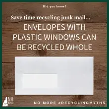 White envelope on a wood table