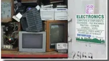 A neat pile of electronic equipment waste