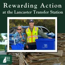 Two smiling people with recycling bins