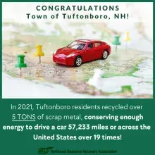 Congratulations Town of Tuftonboro with image of toy car on a map surrounded by thumb tacks