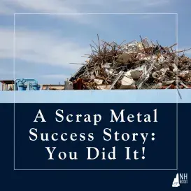 scrap metal pile and a blue sky