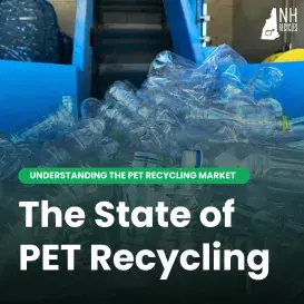 pile of PET plastic bottles at a recycling facility