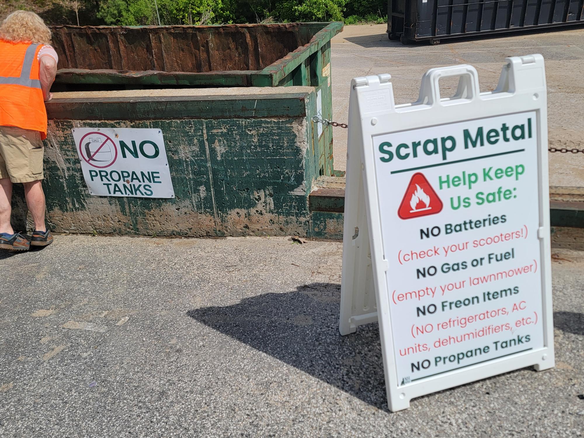 Scrap metal warning as an A-frame sign