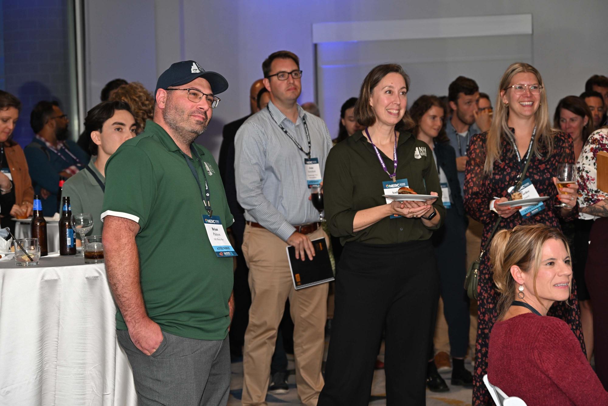 Brian Patnoe and Andrea Folsom listening to award presentation