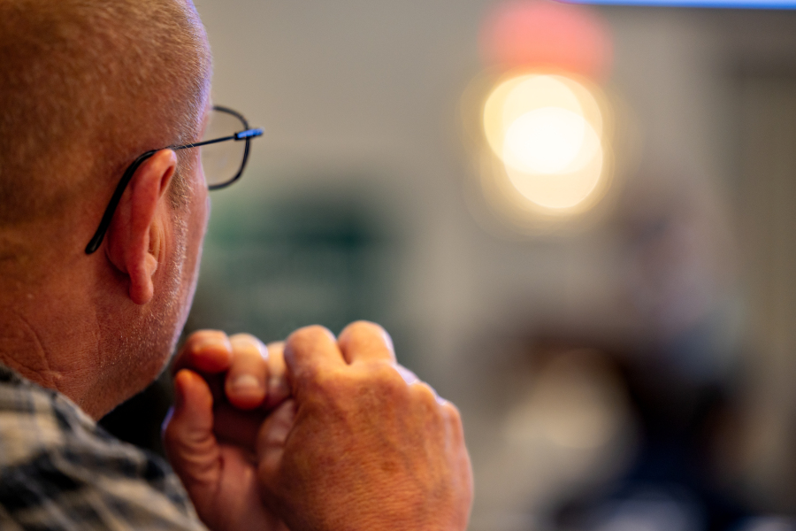 attendee listening closely