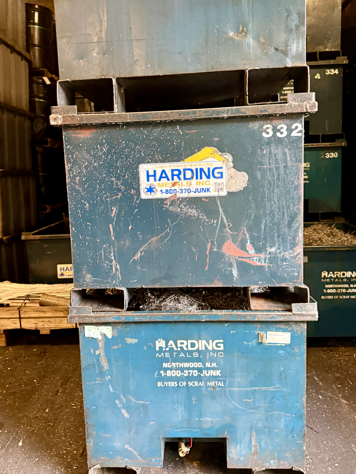 stack of Harding Metals containers