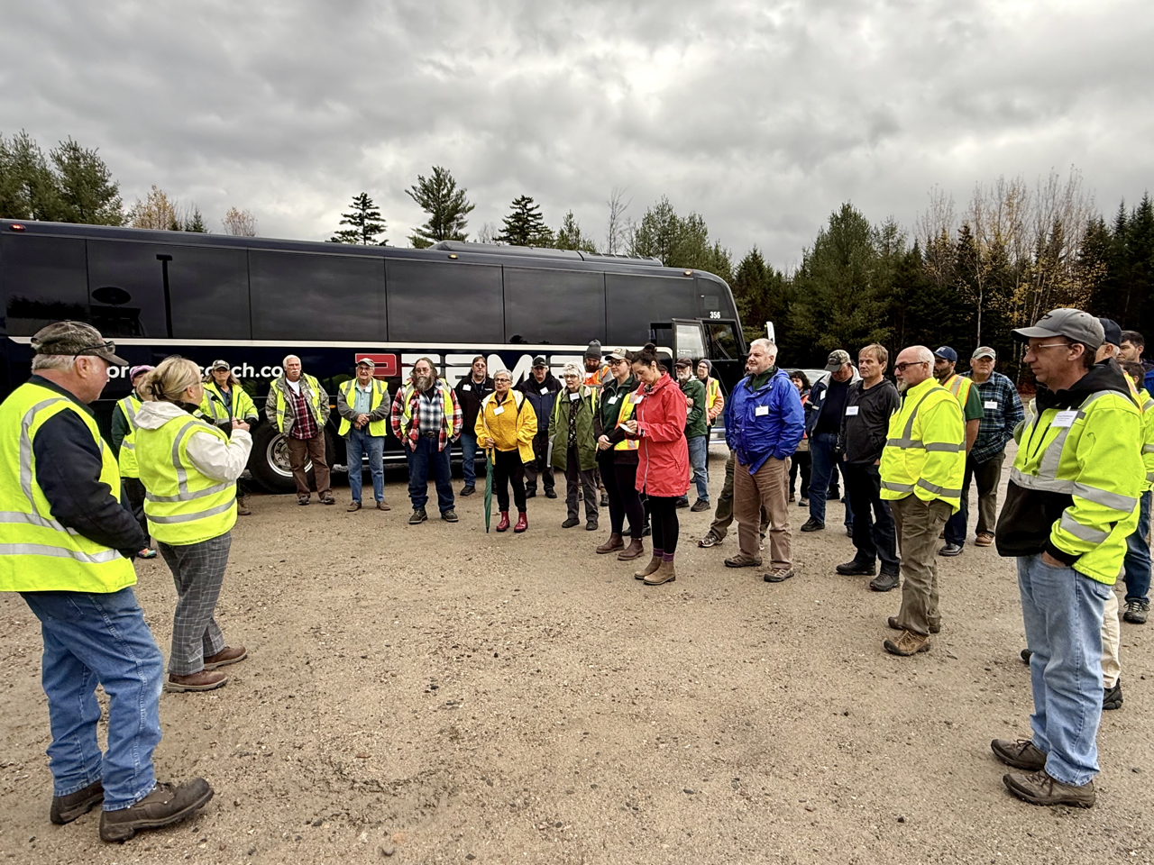 bus tour group listening to presentation at AVRRDD