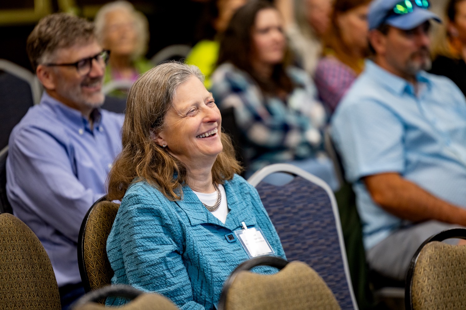 smiling people in a workshop
