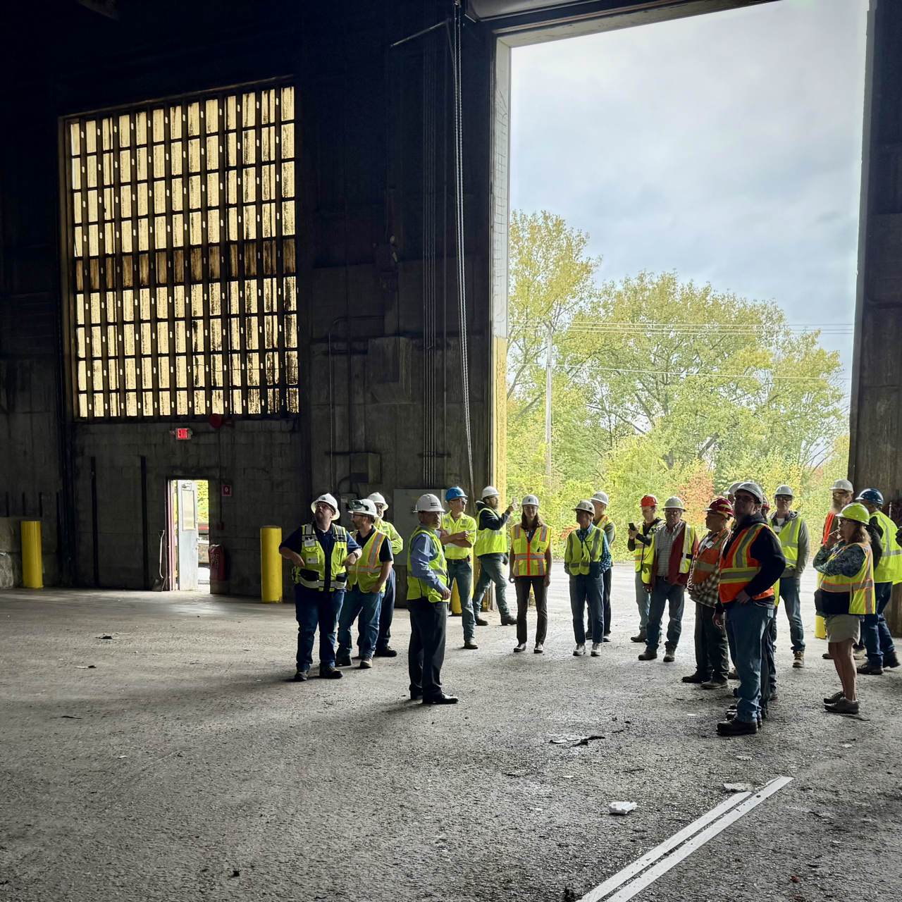 attendees in front of large door