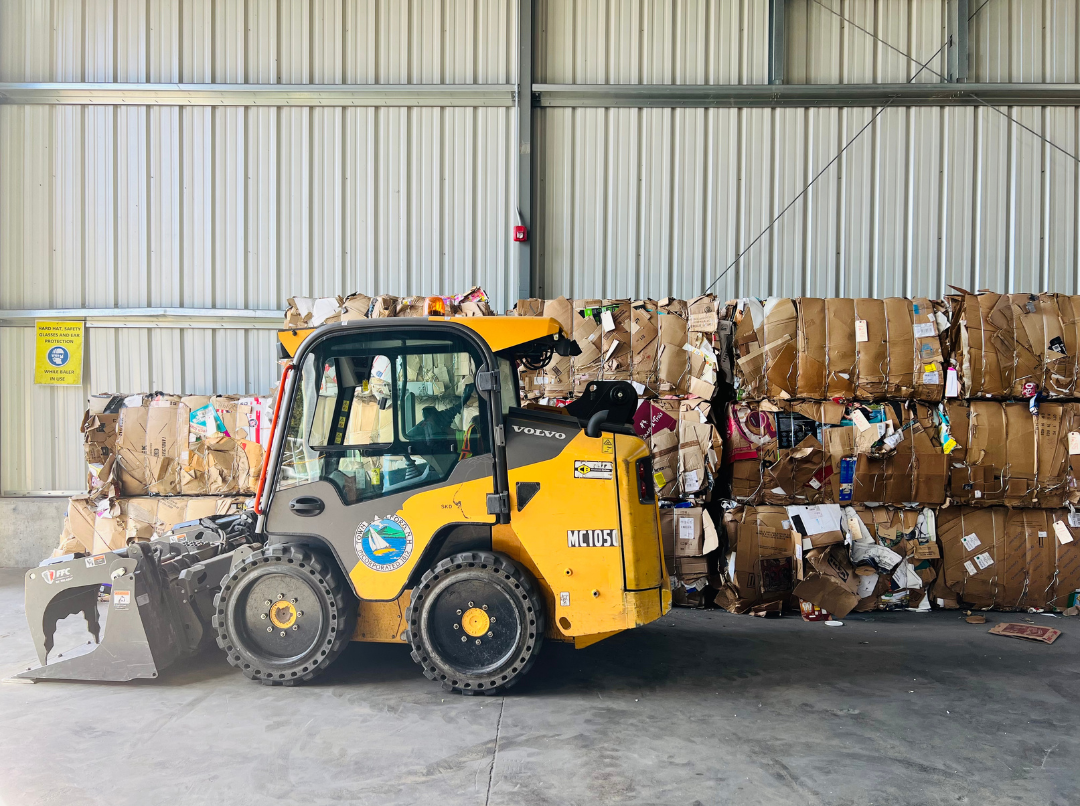 skid steer and cardboard